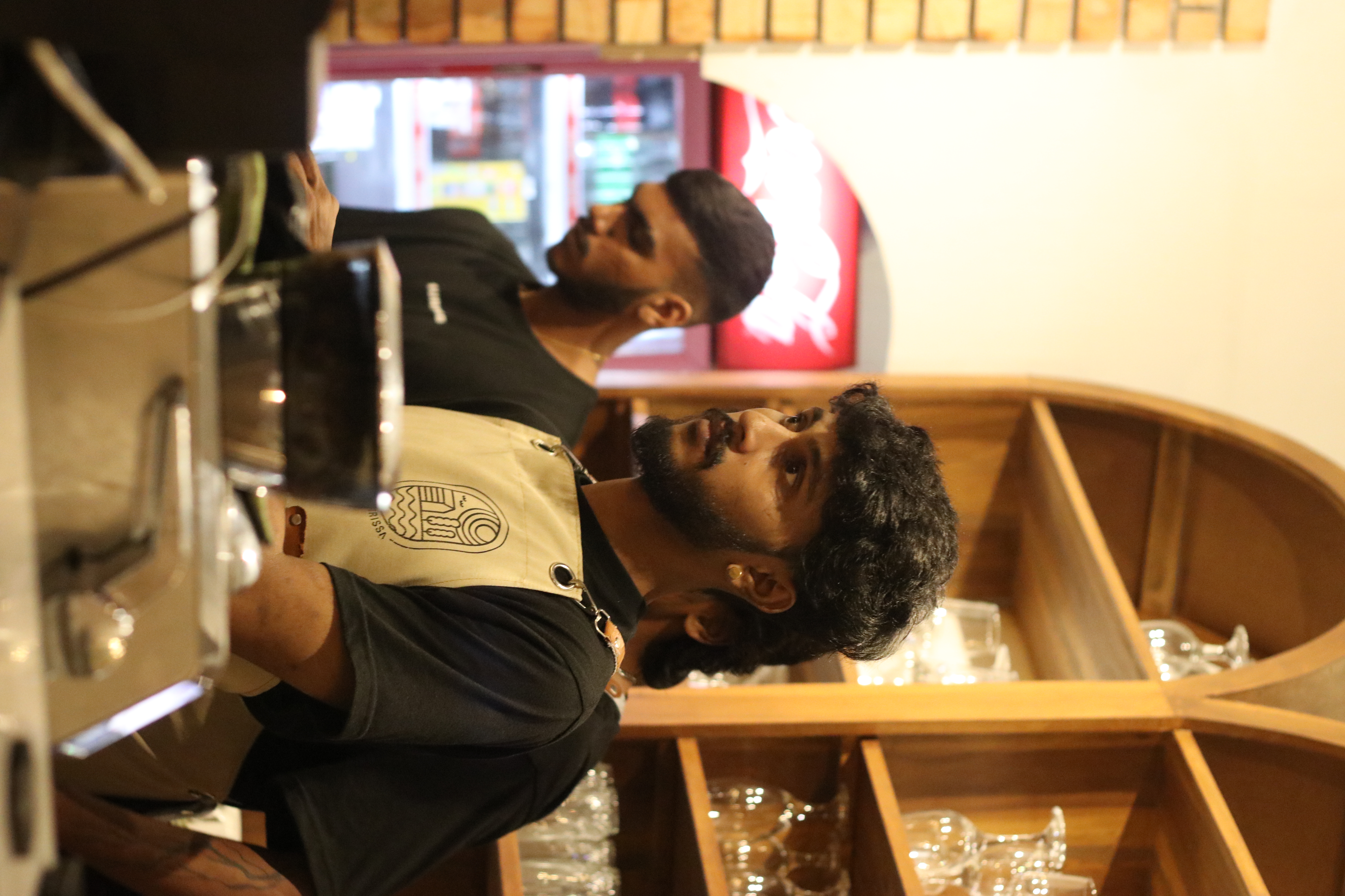 Barista serving coffee